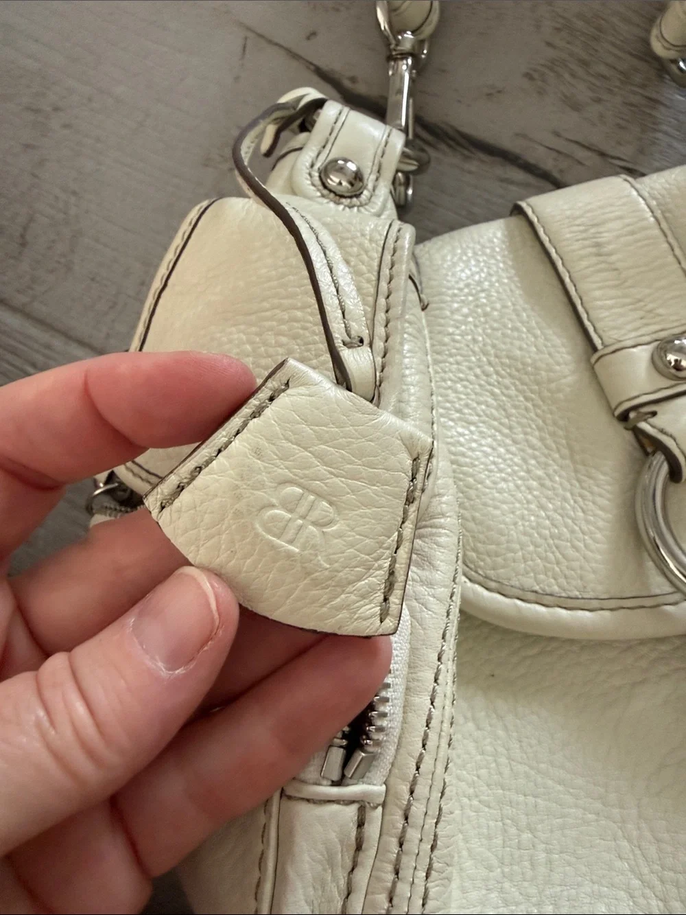 Banana Republic Cream Leather Shoulder Bag with Ring Detail needs good cleaning